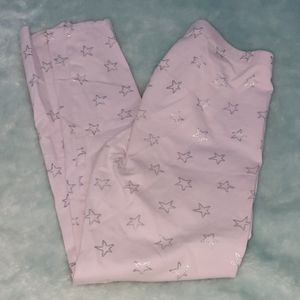 $20Light Purple leggings with silver stars14/16